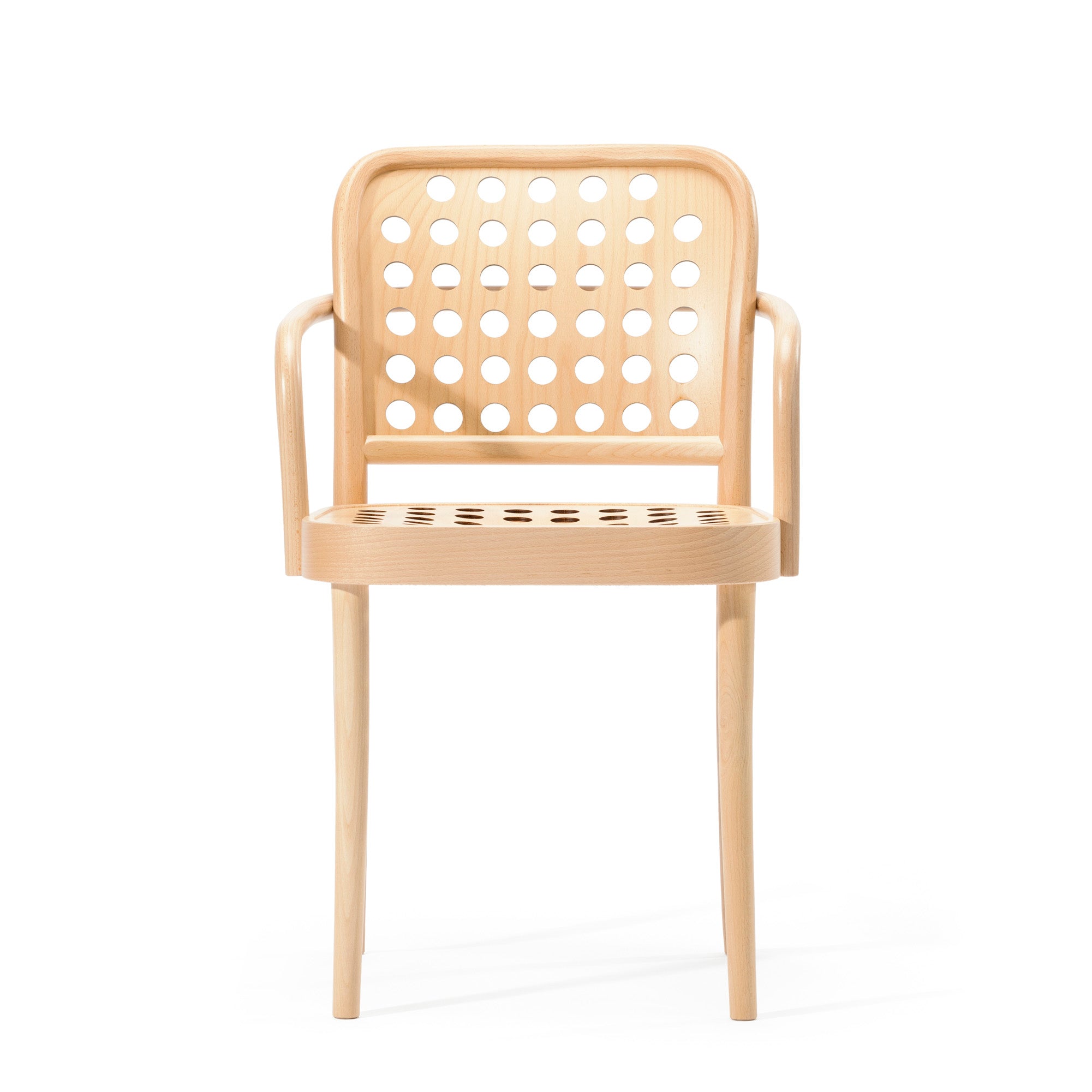 The Armchair 822 by TON, part of the TONDesigner seating collection by Claesson Koivisto Rune, showcases Scandinavian minimalism with its wooden frame, natural finish, perforated backrest and seat with circular cutouts, and straightforward armrests for modern elegance.