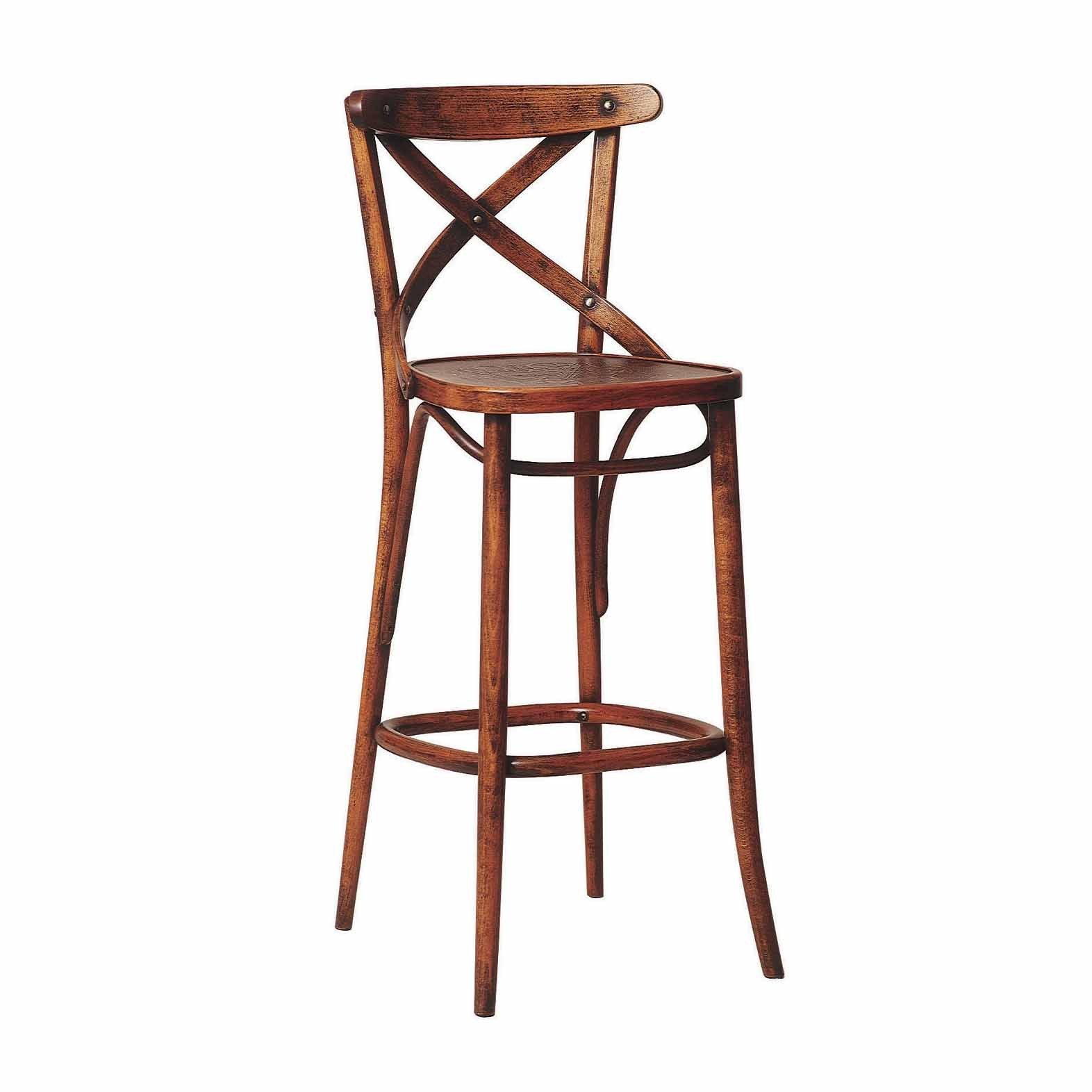 The TON Barstool 150 features a high backrest with a curved cross design, crafted from beech wood. Its legs taper slightly and are connected by a circular footrest, all stained dark brown, offering rustic charm.