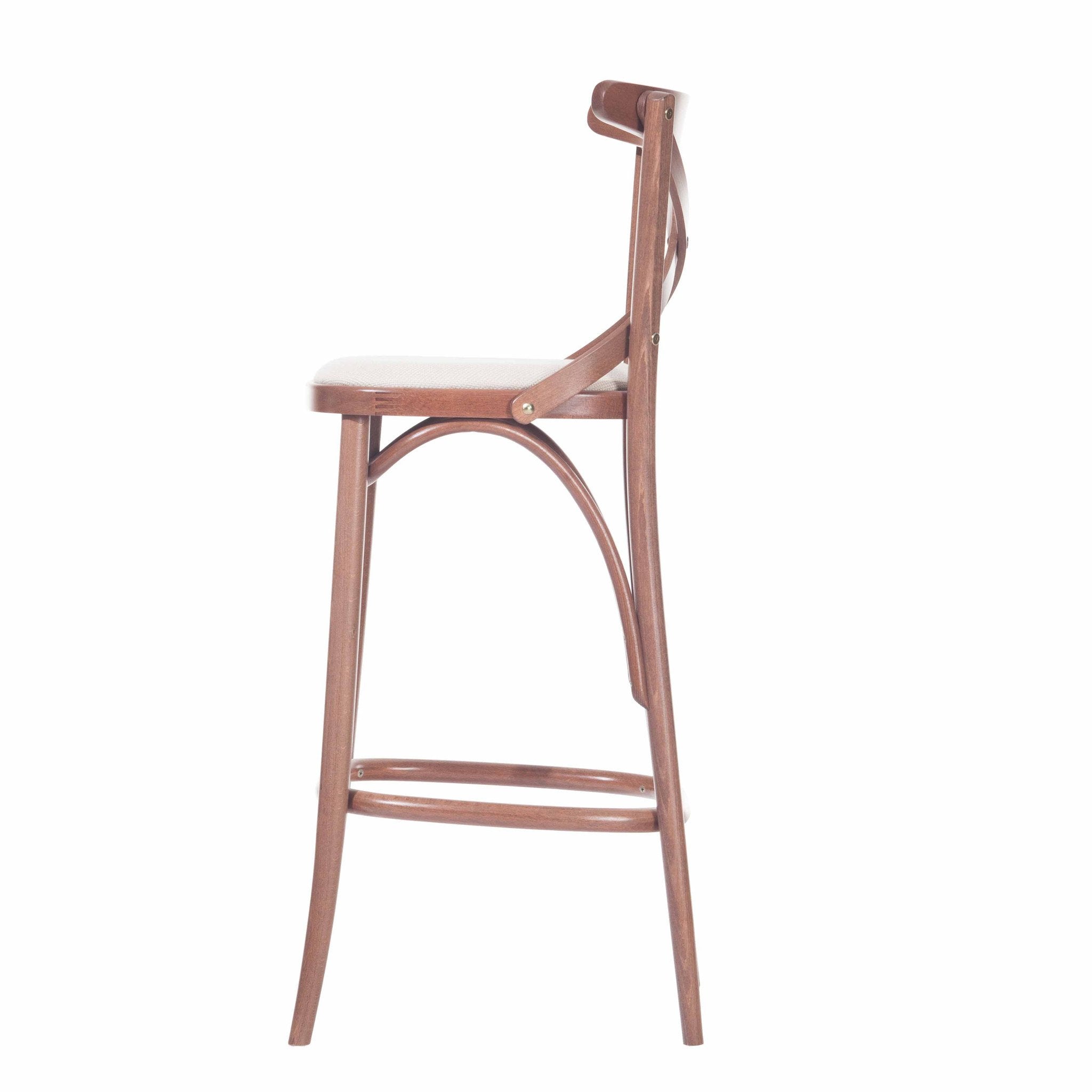 Side view of the stylish TON Barstool 150, featuring a curved backrest and four slender legs. Crafted from beech wood in a warm brown color, it boasts a simple, classic design.