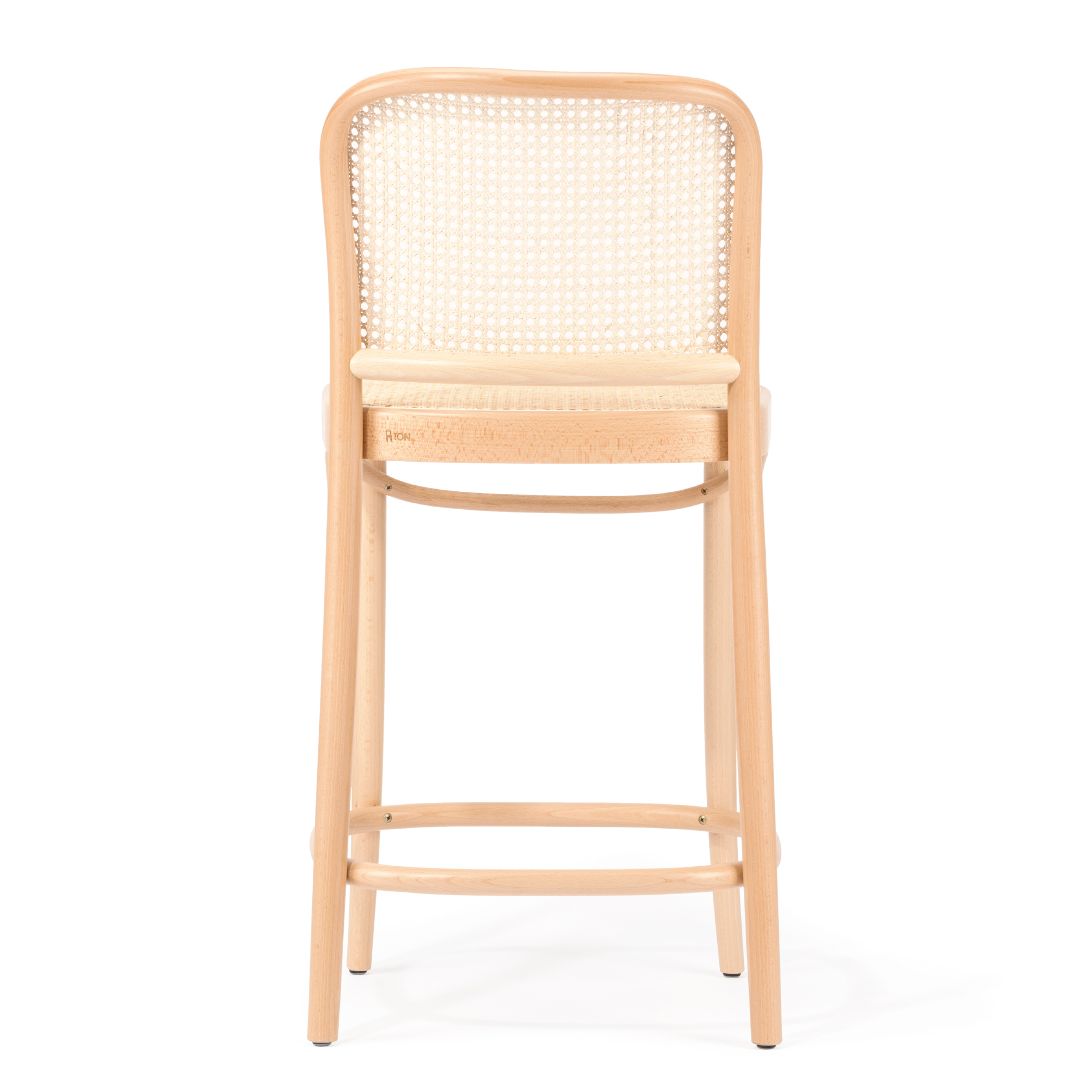 The Barstool 811 - Cane by TON showcases a back view with a rounded cane mesh backrest and light-colored cushioned seat. Crafted from elegant beech wood, its minimalistic design includes long legs and a footrest.