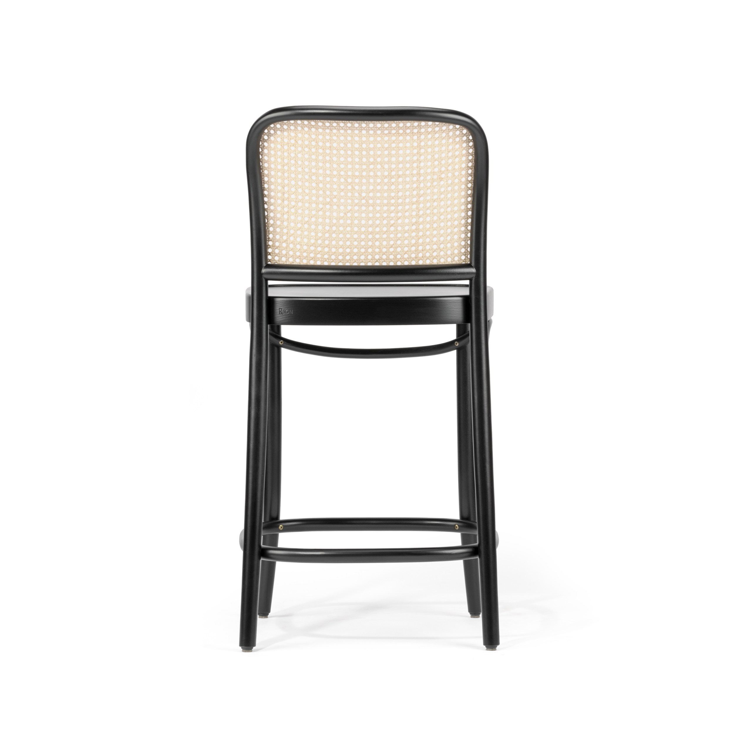 The TON Barstool 811 features a high back crafted from bent beech wood and a woven cane mesh backrest. Its sleek black frame includes a footrest, perfect for enhancing modern or classic interiors. Viewed from the rear, its simple and elegant design stands out.