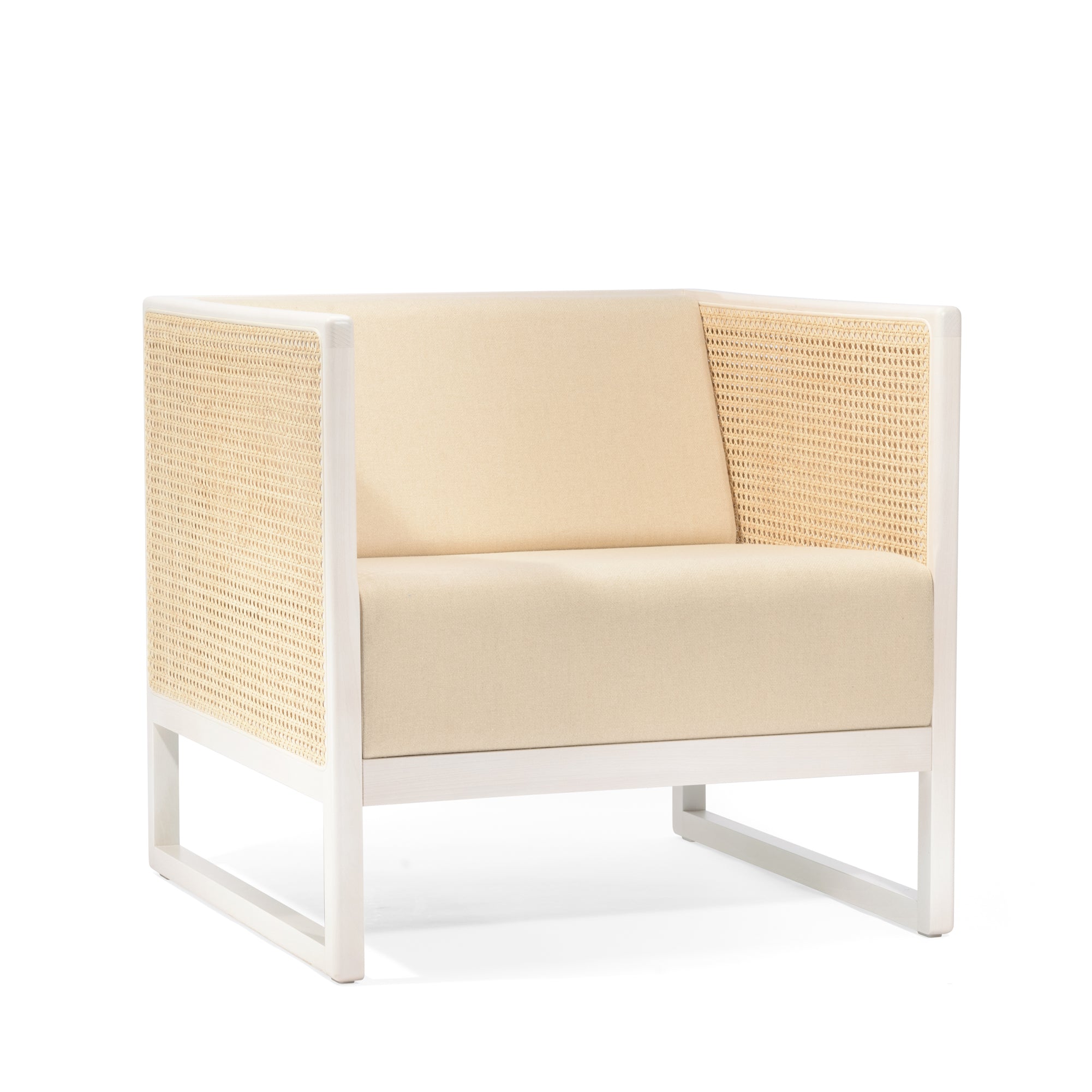 The Armchair Casablanca by TON features a beige cushion, light wooden frame, and intricate cane weave armrests, all set against a white background.