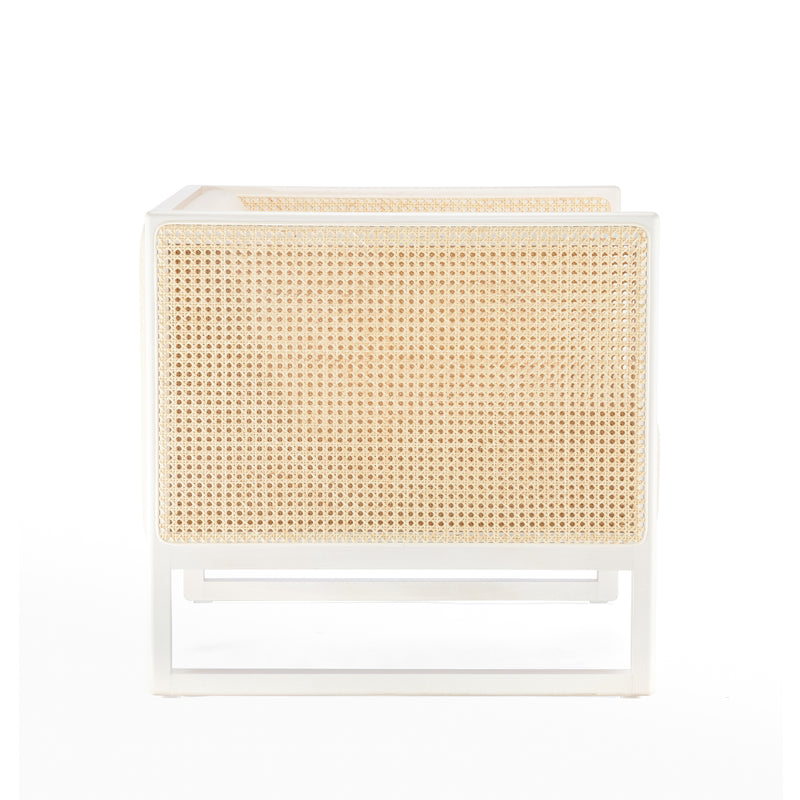 Side view of the Armchair Casablanca by TON, showcasing its stylish design with a white metal frame, wicker sides, and cane weave armrests. The modern chair blends contemporary and natural materials against a plain white background.