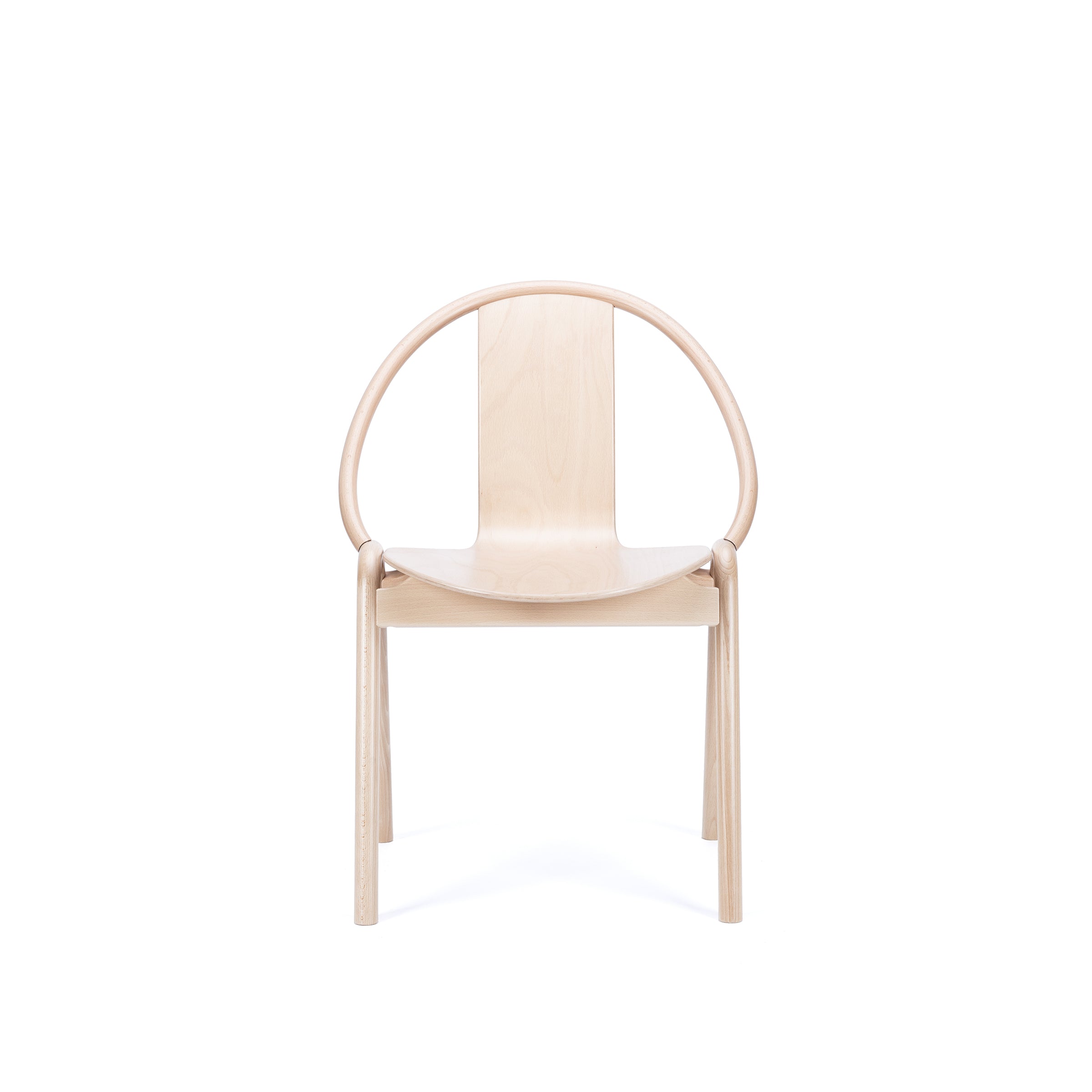 The Chair Again by TON is a minimalist bentwood chair with a circular backrest and flat seat, shown in light color against a white background, showcasing its simple design, smooth finish, and stackable nature for versatile spaces.