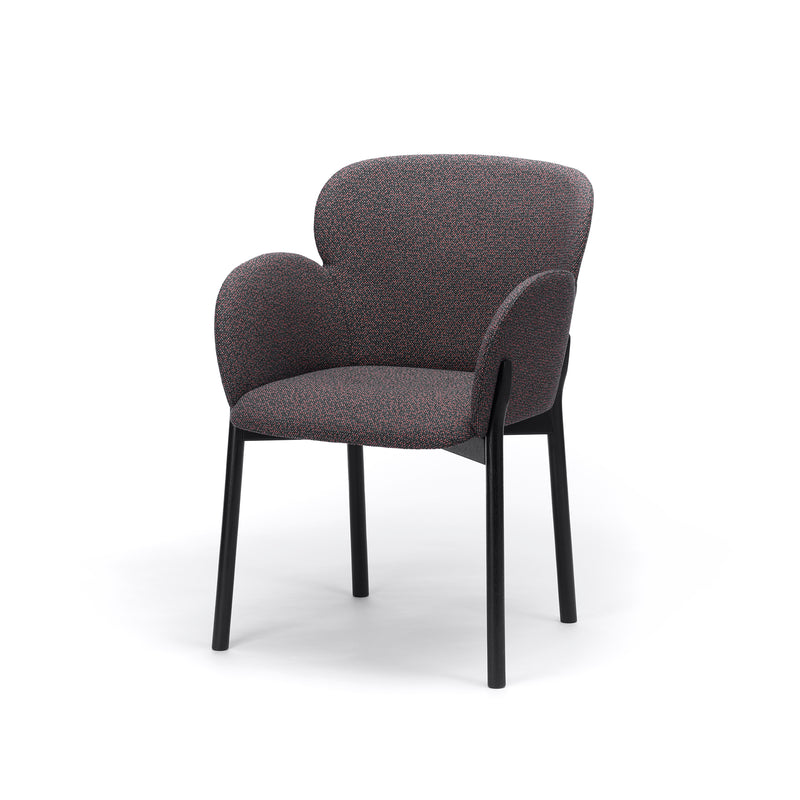 Introducing the Armchair Ginger by TON: a masterpiece of contemporary design featuring rounded armrests, a cushioned backrest in dark gray patterned fabric, and four sleek straight black legs.