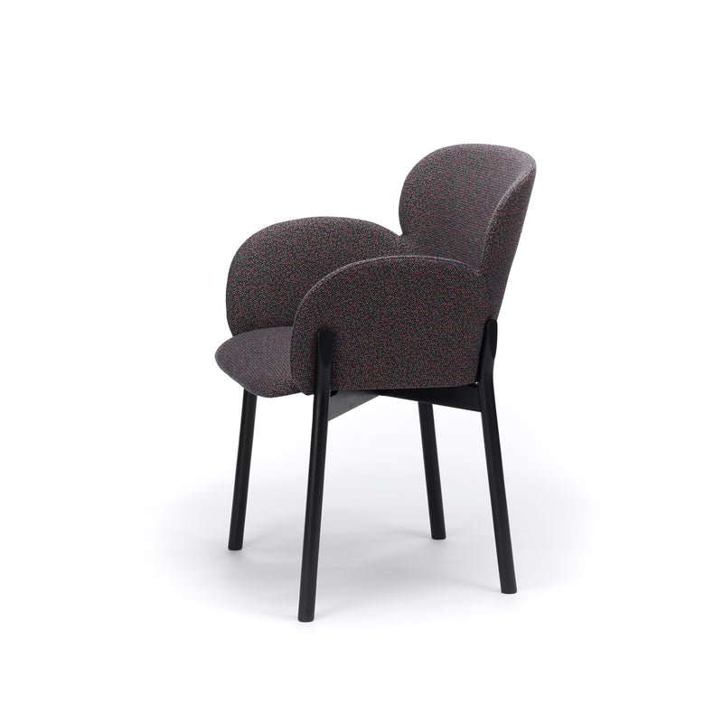 Discover the plush Armchair Ginger by TON, showcasing a contemporary design with dark speckled upholstery and sleek black legs for timeless elegance.