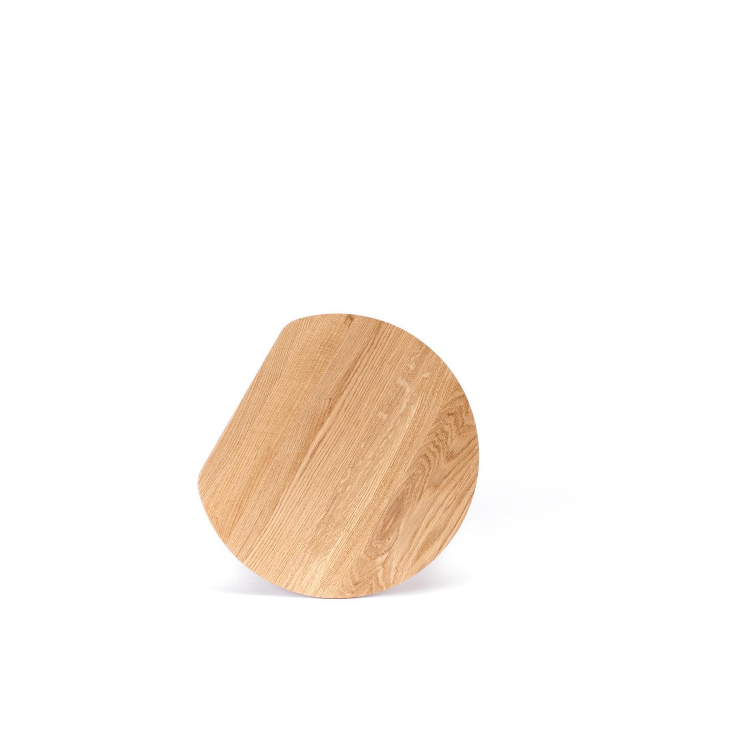 The YYY Coffee Table by TON, made from natural oak, features a flat, round design with a straight edge like a circle slice. It rests on a simple white background, highlighting its rich wood grain reminiscent of elegant coffee tables.