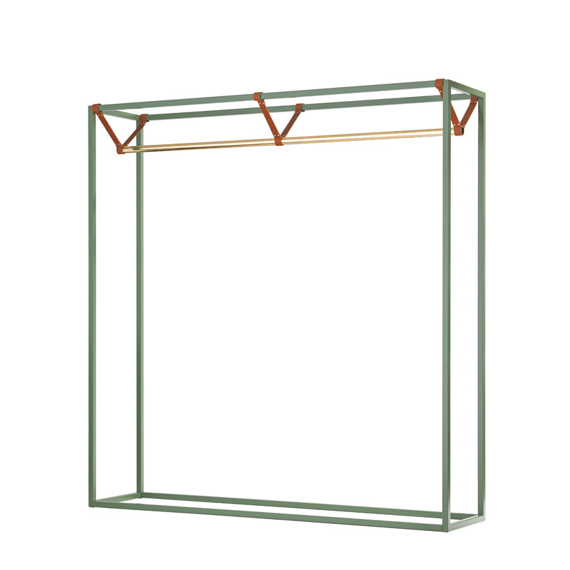 The LESS MESS Coat Stand by Victor Foxtrot is a minimalist green metal clothing rack with vegetable-tanned leather strap accents, featuring a single polished brass hanging rod. Its open, rectangular powder-coated steel frame is perfect for modern and stylish storage solutions.