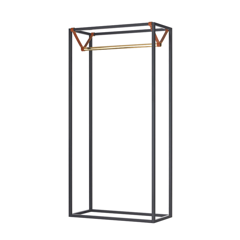 The LESS MESS Coat Stand by Victor Foxtrot boasts a minimalist open wardrobe design with a black, powder-coated steel frame and a polished brass hanging rod. Its rectangular structure is elegantly connected by two vegetable tanned leather straps, offering a modern touch.