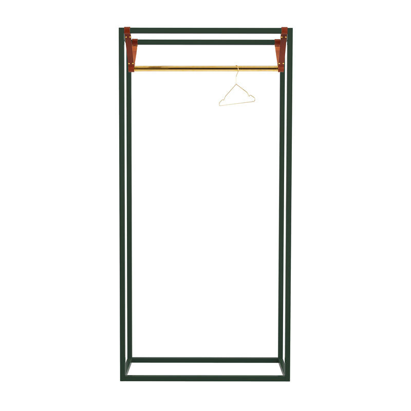 The Victor Foxtrot LESS MESS Coat Stand is a minimalist freestanding wardrobe with a dark green powder-coated steel frame, wooden shelf, and polished brass rail. A single wire hanger rests elegantly on the rail, highlighting its simple yet sophisticated design.