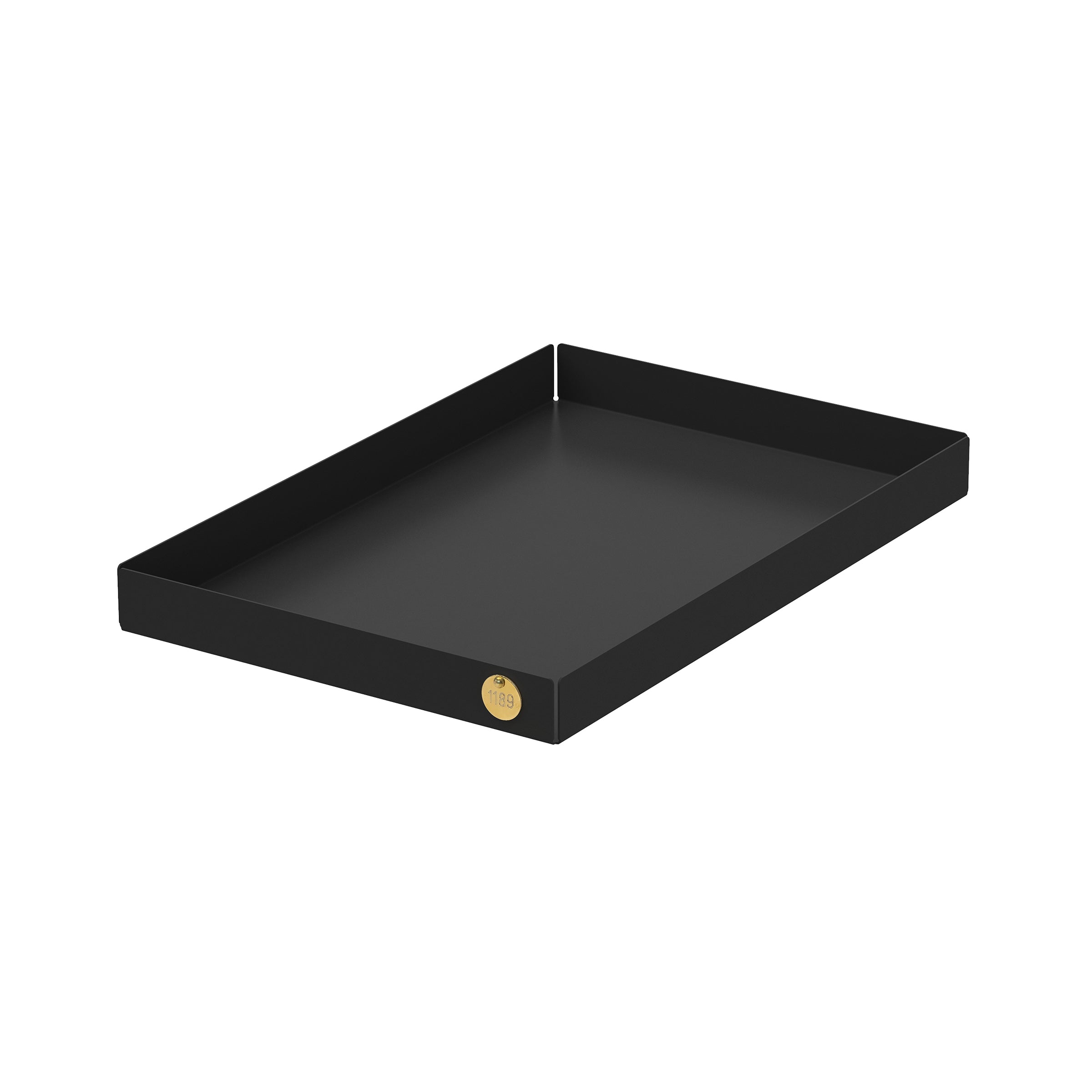 The black POI Tray L by Victor Foxtrot, made from powder-coated steel, boasts raised edges and a subtle gold emblem. Its minimalist design shines against a plain white background.