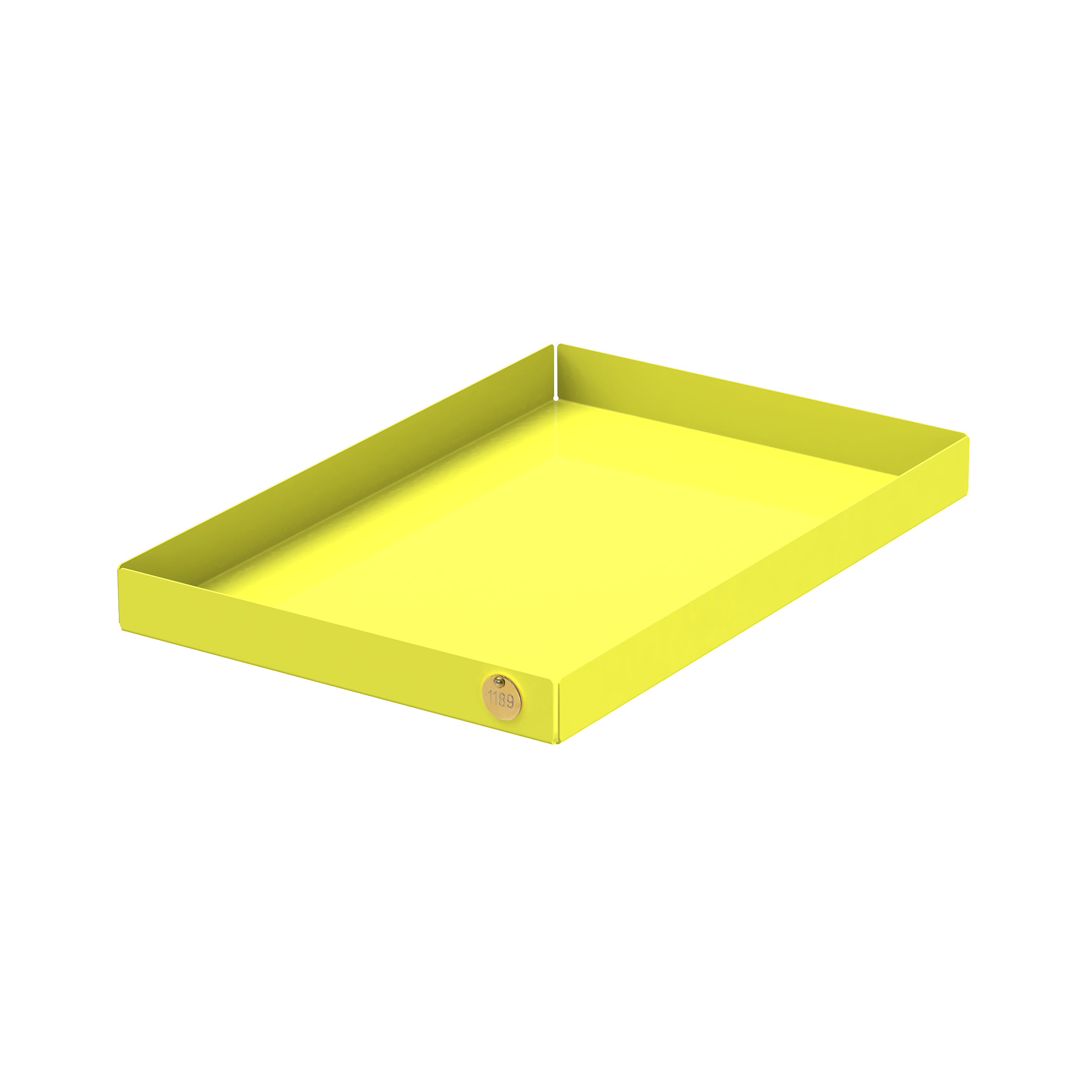 On a white background, the POI Tray L by Victor Foxtrot features a bright yellow hue, is rectangular with high edges, and made of powder-coated steel. The Victor Foxtrot logo is visible as a small circle on the trays bottom left corner.