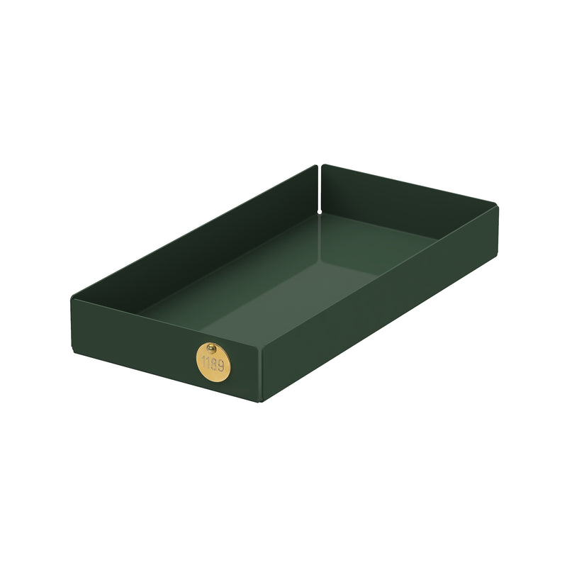 A dark green, rectangular POI Tray M by Victor Foxtrot, made of powder-coated steel with high sides and a small circular gold emblem labeled 1189. Its simple, modern design is ideal for design lovers.