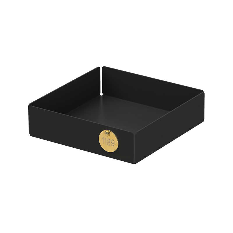 The Victor Foxtrot POI Tray S is a black square metal container with short sides made from powder-coated steel, featuring a small gold label with 1139. Ideal for design lovers, it offers a sleek, minimalist aesthetic.