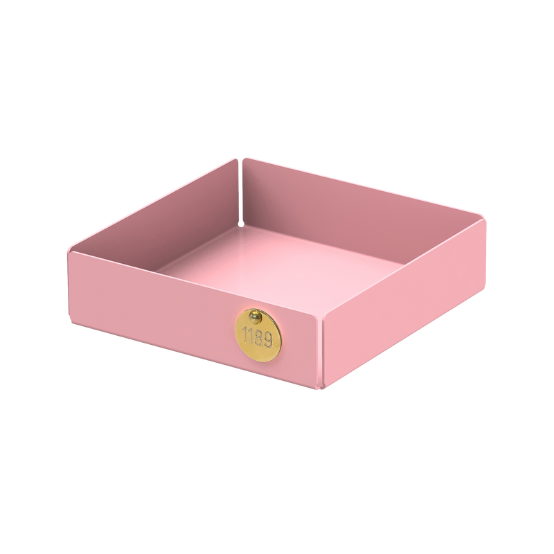 The POI Tray S by Victor Foxtrot is a simple square pink powder-coated steel desk tray with low sides, perfect for organizing papers. Featuring a small circular 1139 label on the corner, its ideal for design lovers and stands out against a plain white background.