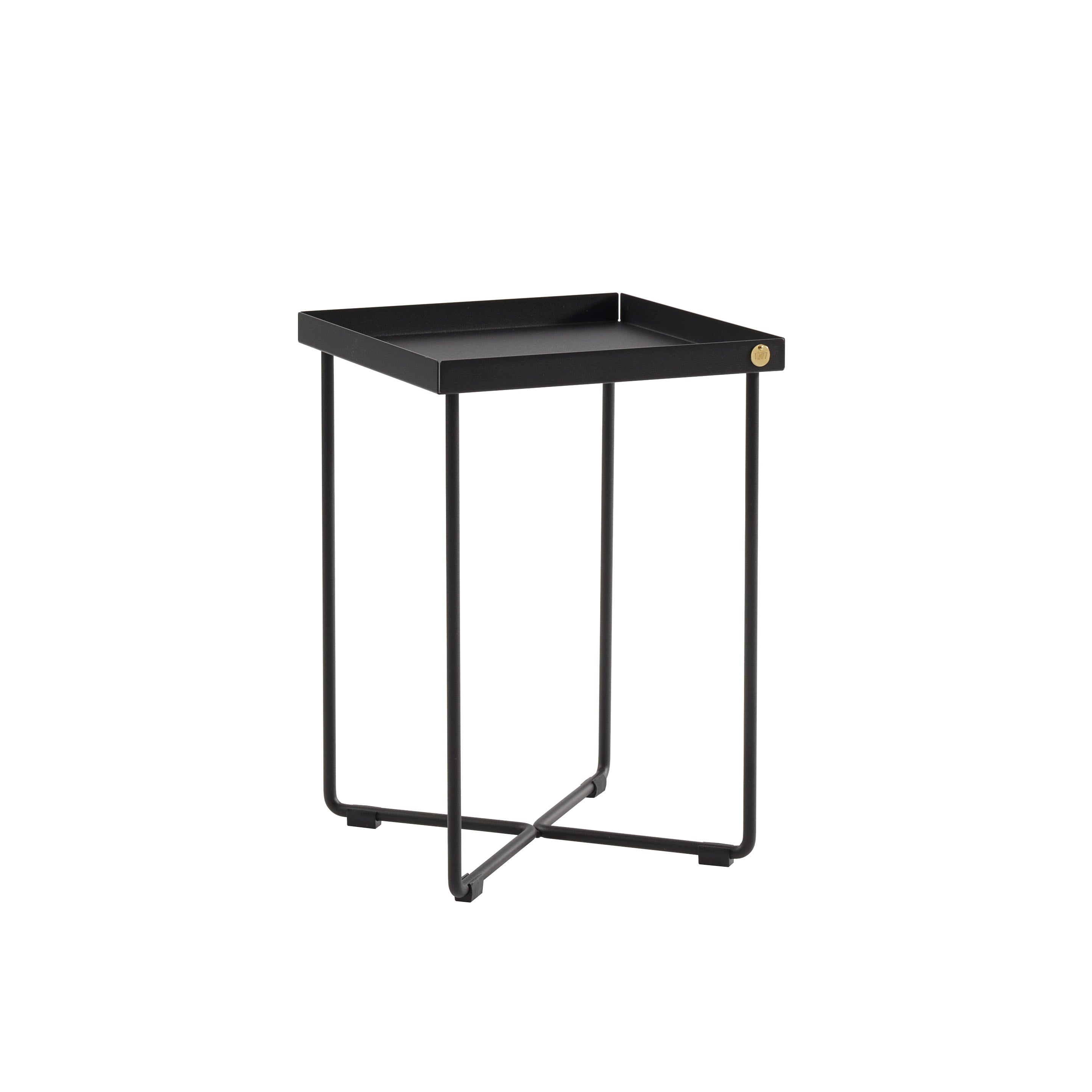 The POI MINI Side Table by Victor Foxtrot is a sleek, modern piece with a square top and minimalist design, featuring thin black metal legs that cross at the base.