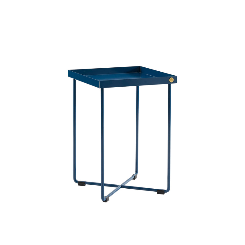 The POI MINI Side Table by Victor Foxtrot is a small, modern piece featuring a square, deep blue tray top and slender metal legs, offering a minimalist and stylish design.