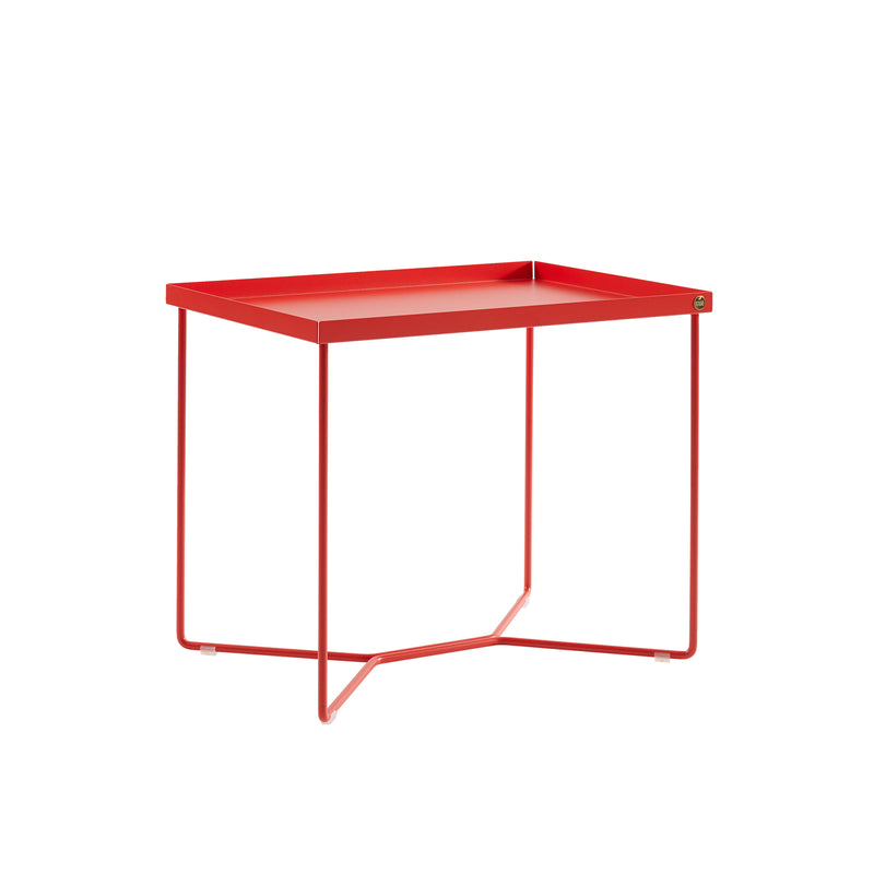 The POI SINGLE Side Table by Victor Foxtrot is a minimalist piece made from powder-coated steel, featuring a red rectangular top with raised edges, and sleek thin legs connected by a crossbar, embodying modern design.