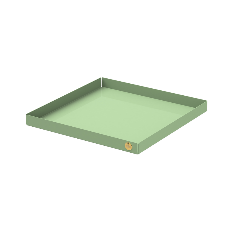 The POI Tray XL by Victor Foxtrot is a square, shallow tray crafted from powder-coated steel in muted green. Its minimalist design is enhanced by a small round sticker in one corner, adding sleek appeal against a plain white background.