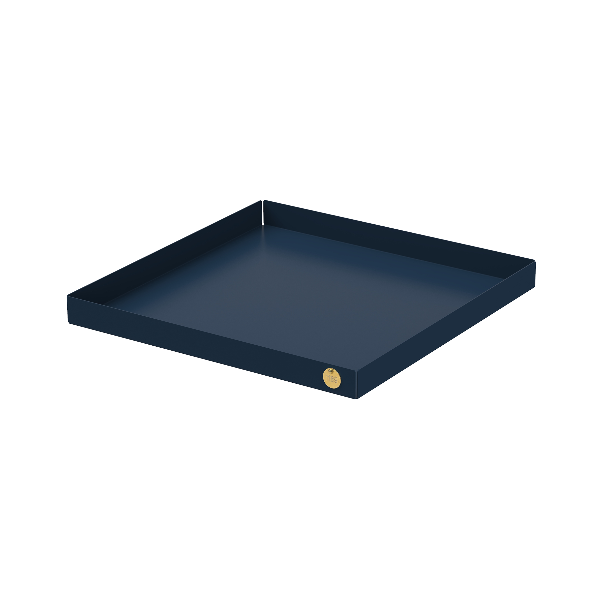 The POI Tray XL by Victor Foxtrot is a square, dark blue tray made from powder-coated steel. It features raised edges, a small golden emblem, and its minimalist design is ideal for enthusiasts seeking elegance against a white backdrop.
