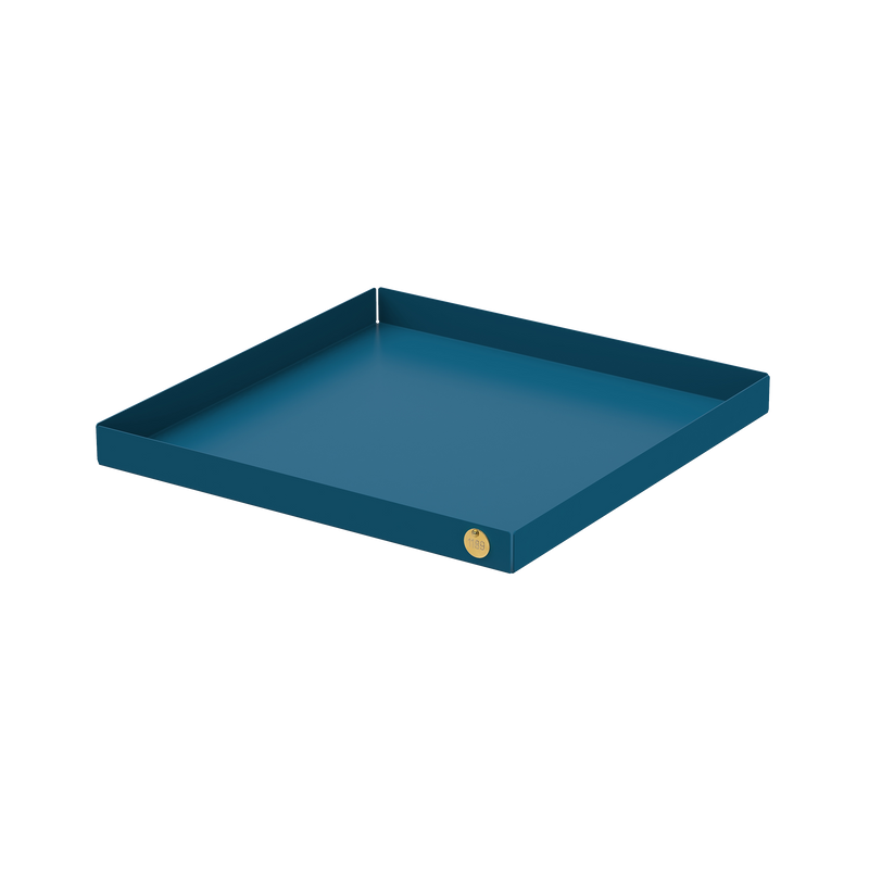 The POI Tray XL by Victor Foxtrot is a square, teal tray made from powder-coated steel, featuring raised edges and a small gold circular emblem on one corner. Perfect for design lovers, it rests elegantly on a plain white background.