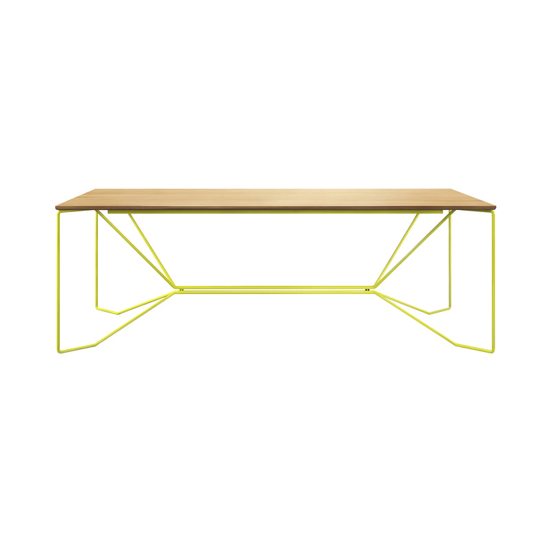 The Victor Foxtrot SAME SAME Oak Table features a solid oak top and bright yellow powder-coated steel geometric legs, offering a minimalistic design focused on angular shapes for a contemporary, stylish look.
