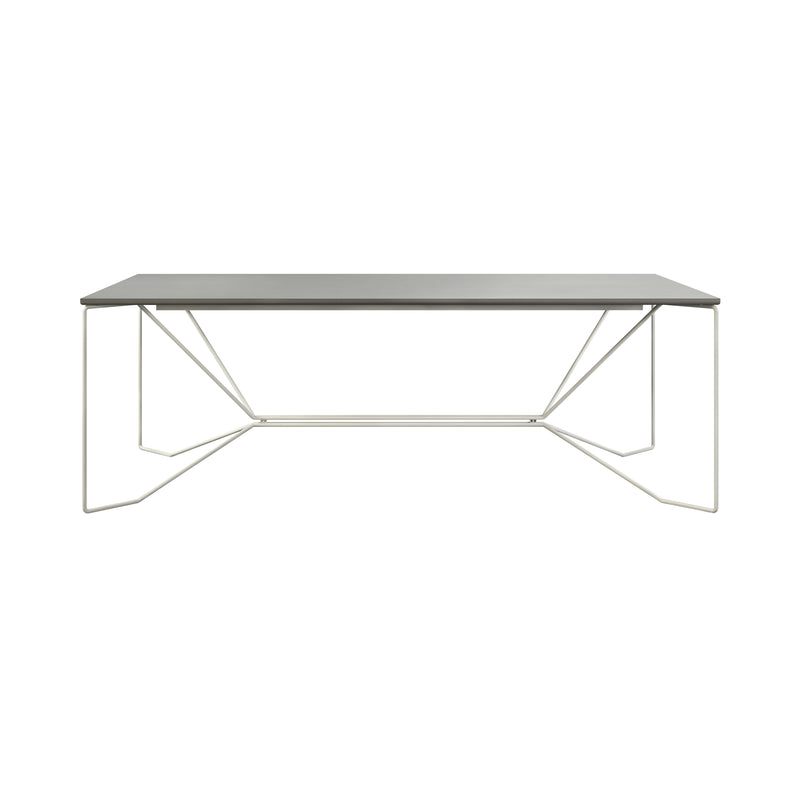 The SAME SAME Linoleum Table by Victor Foxtrot features a modern dark rectangular top and a geometric base made of powder-coated steel with angled lines and open sides, set against a white background.