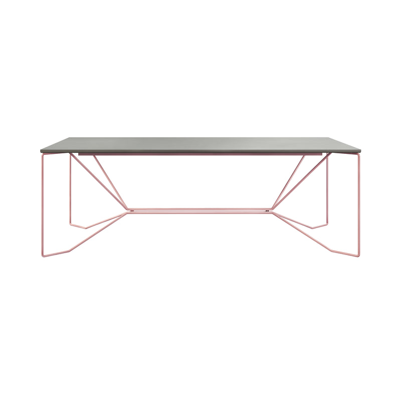 The SAME SAME Linoleum Table by Victor Foxtrot is a modern rectangular dining table with a sleek gray tabletop and geometric pink powder-coated steel legs. Its minimalist design features thin, angular supports for a contemporary look perfect for any stylish setting.