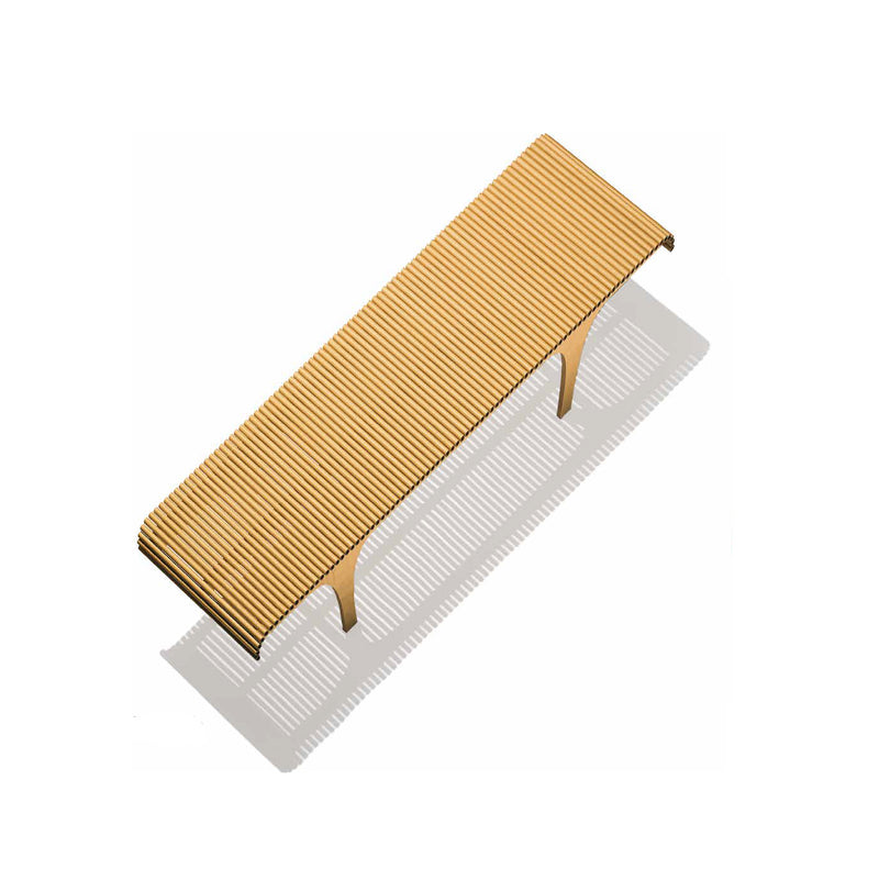 The Carta Bench by WB Form is a long, rectangular wooden piece with a slatted design and two minimalist legs on a white background, echoing Shigeru Bans sustainable and simple ecological furniture.