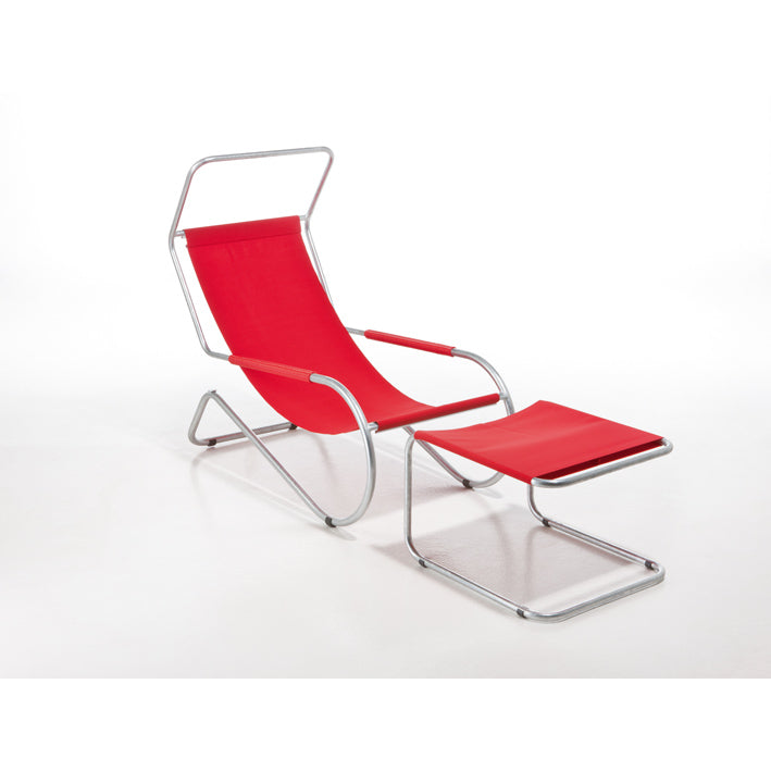 The Lido Ottoman by WB Form features a modern red design with a sleek tubular steel frame, complemented by smooth curves and minimalist lines for style and comfort. It includes a matching footrest, all set against a plain white background.