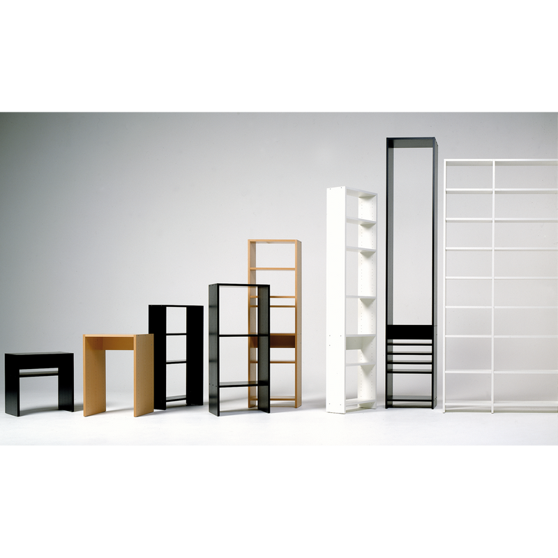 Displayed against a white background, the UPW Shelf by WB Form offers minimalist bookshelf units crafted from sustainable materials in black, white, and wood tones. Some shelves feature closed back panels while others have an open shelving system.