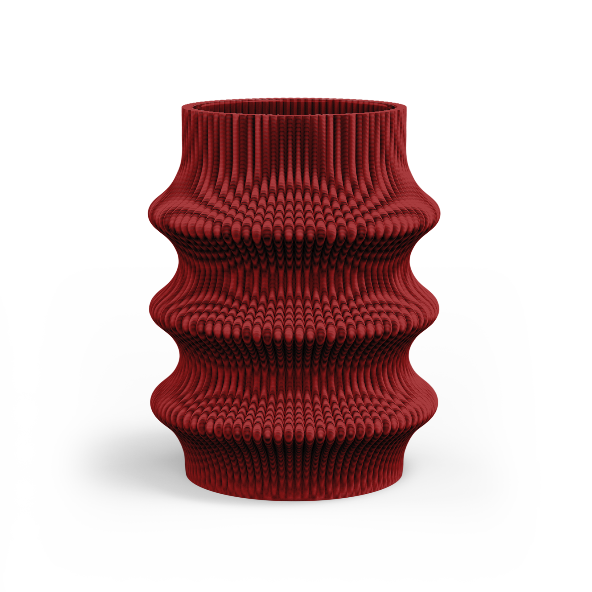 The Zayl 129g Vase by Sheyn is a red, cylindrical piece with a ribbed, wavy surface, created through eco-friendly 3D printing. Its undulating design on a white background highlights modern digital innovation and sustainability.