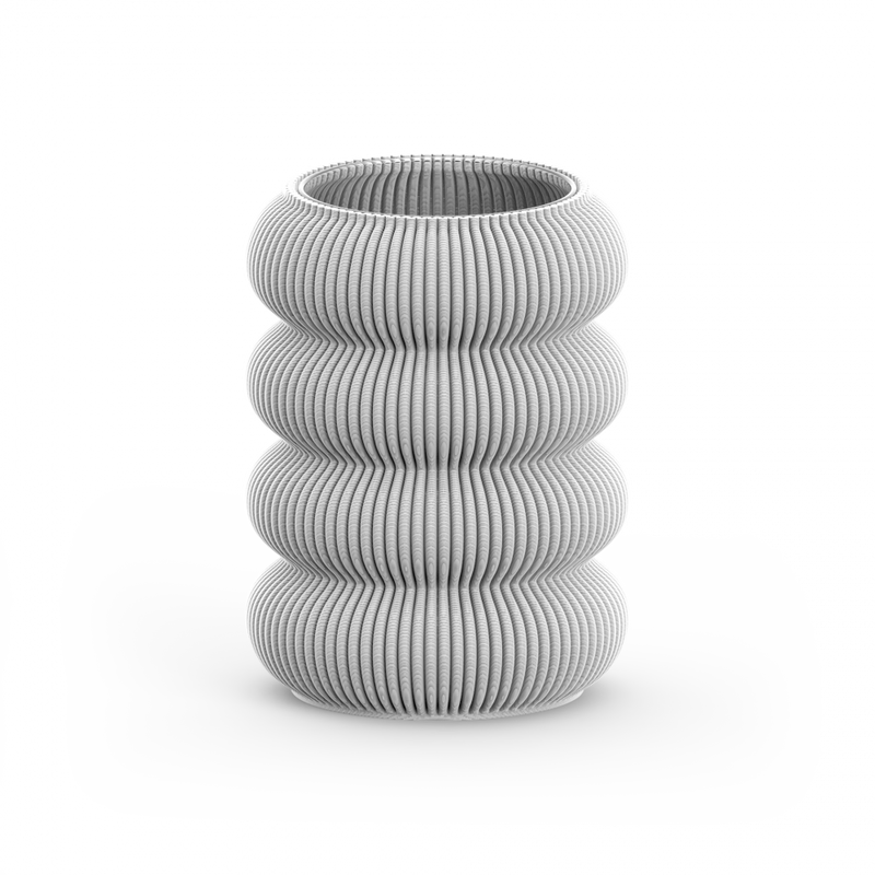 The Zayl 130g Vase by Sheyn is a gray, ribbed ceramic vase with a unique wavy design similar to architectural pillars, featuring four stacked bulbous rings and a smooth cylindrical opening, set against a plain white background.