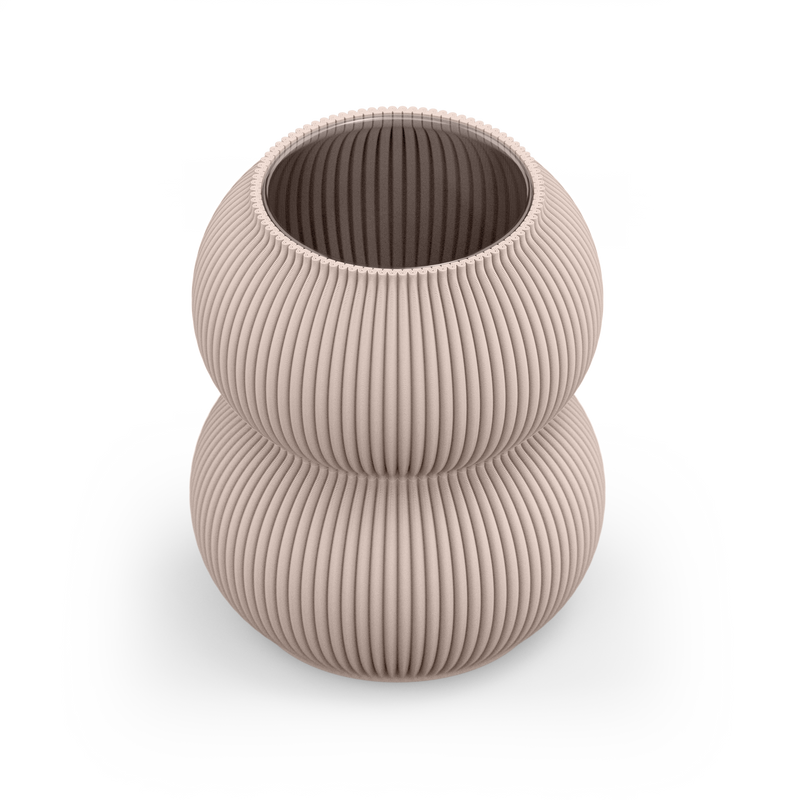 The Zayl 159g Vase by Sheyn is a light beige, eco-friendly piece with a double-layered design, vertical ridges, and two stacked sphere shapes. Made from recyclable materials, it sits elegantly on a plain light gray surface.