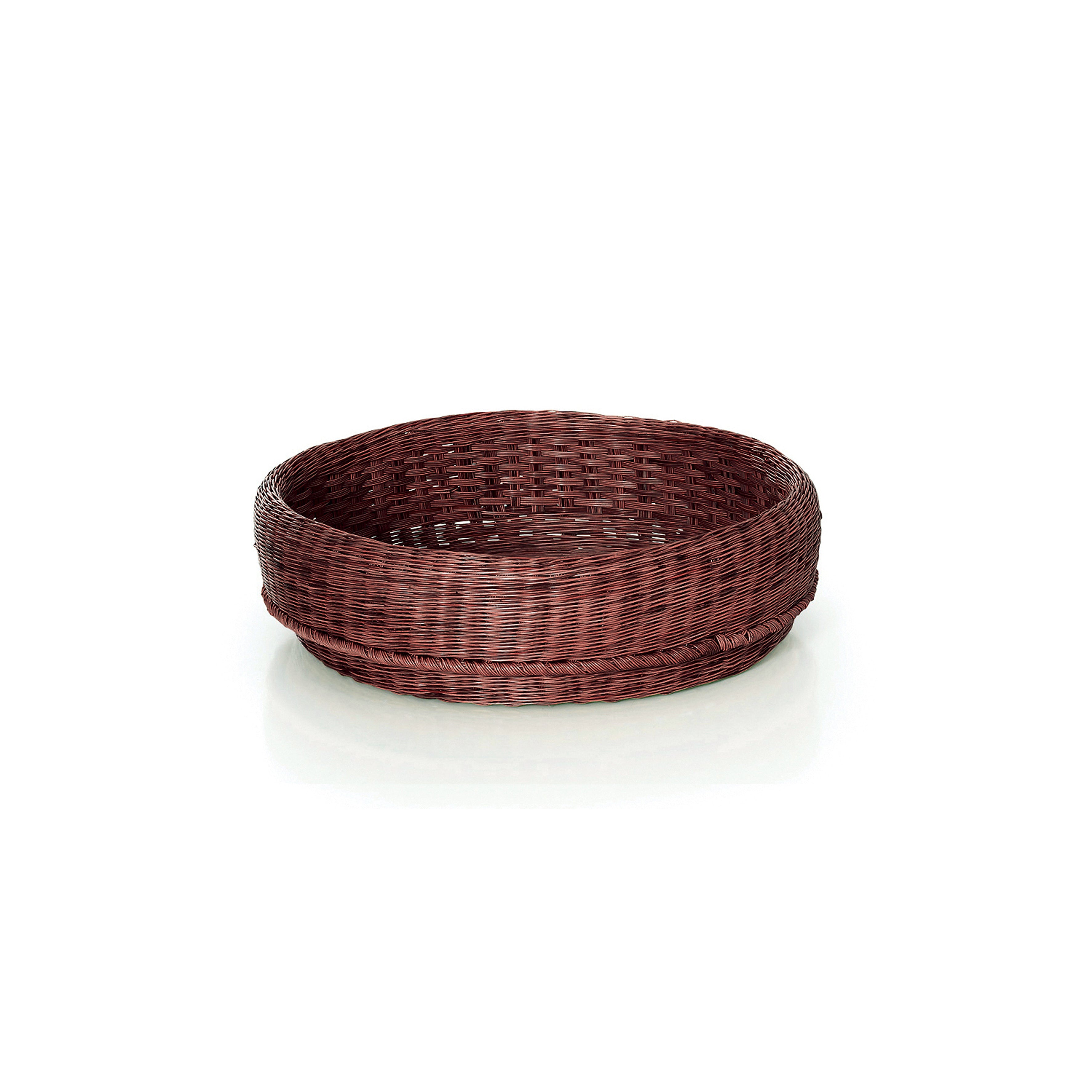 The Fibra Basket Medium by Ames is a round brown wicker basket, handcrafted in Colombia and set against a white background.