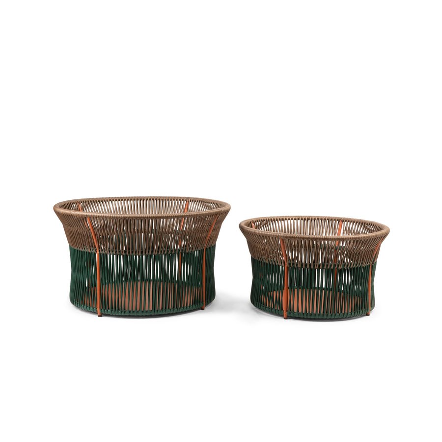 The Caribe Chic Basket 3 by Ames features two chic baskets, one large and one small, with brown tops and green bases. Crafted with traditional braiding, their open weave and circular shape make them ideal for decor or storage.