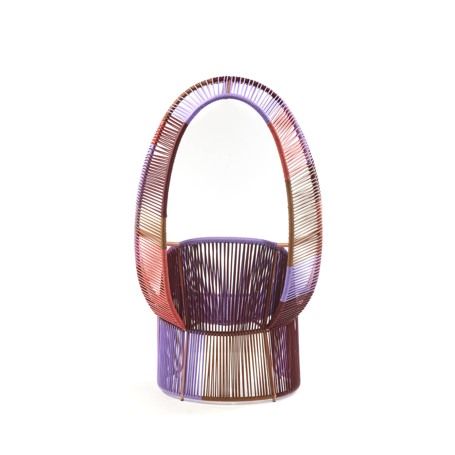 From the Ames Cartagenas collection, the limited edition Reina Chair features an arched backrest and a vibrant base of tightly woven strings in purple, red, and brown, offering a unique and modern touch to any outdoor area.