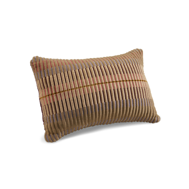Ames Chumbes Cushion: A rectangular, ribbed corduroy pillow in brown by Ames, featuring subtle vertical blue stripes and thin red and yellow accent lines, shown on a white background.