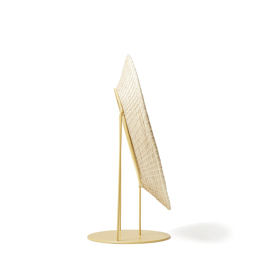 A side view of the Ames Killa Standing Mirror by Ames, featuring a modern circular base and slender frame, photographed against a plain white background.