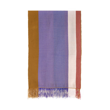 The Maraca Hammock by Ames features a rectangular fabric with vertical stripes in gold, purple, white, and red. It evokes the ethnic designs of Colombian hammocks with fringed edges matching these colors, delicate patterns throughout, and a plain white background.