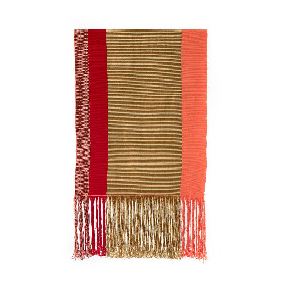 The Maraca Hammock by Ames features ethnic-inspired woven textile with vertical stripes in red, brown, and orange. It includes thin horizontal lines on the brown section and a matching fringe, all highlighted against a plain white background to emphasize its vibrant patterns.