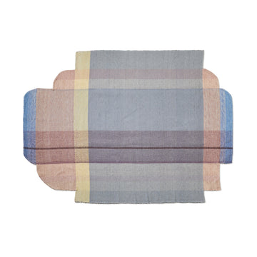 The Ames Muyska Rug by Ames is a contemporary hand-woven wool rug with softly rounded corners, showcasing overlapping bands of muted gray, pink, blue, yellow, and beige in a plaid-like abstract pattern on a white background.