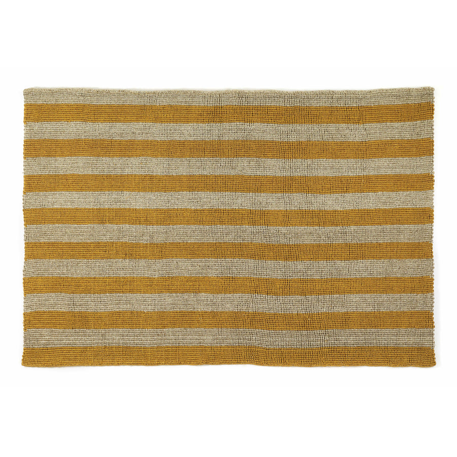 The Ames Par Raya Rug features a handcrafted look with alternating horizontal stripes in mustard yellow and beige, reminiscent of natural fiber carpets.