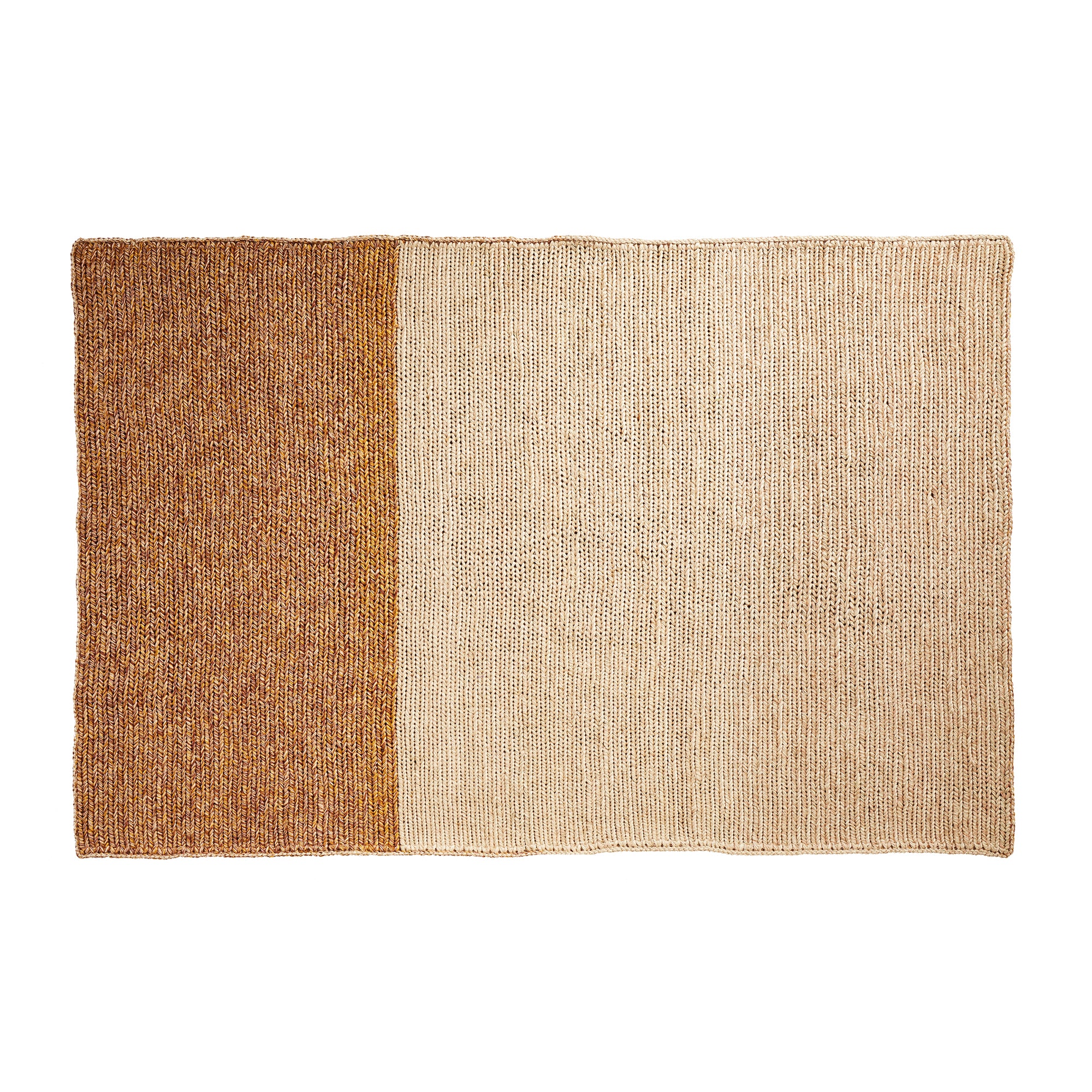The Ames Par Rug by Ames is a rectangular woven rug made from the fique plant, with a textured knit-like look and two color blocks: brown on the left and a larger beige section on the right.