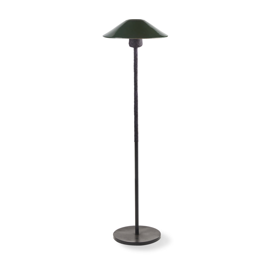 The Ames Raiz Floor Lamp by Ames features a dark green, wide, shallow lampshade, a slim black pole, and a round flat base. Inspired by Colombian craftsmanship, its minimalist design adds an elegant, modern touch to any space.