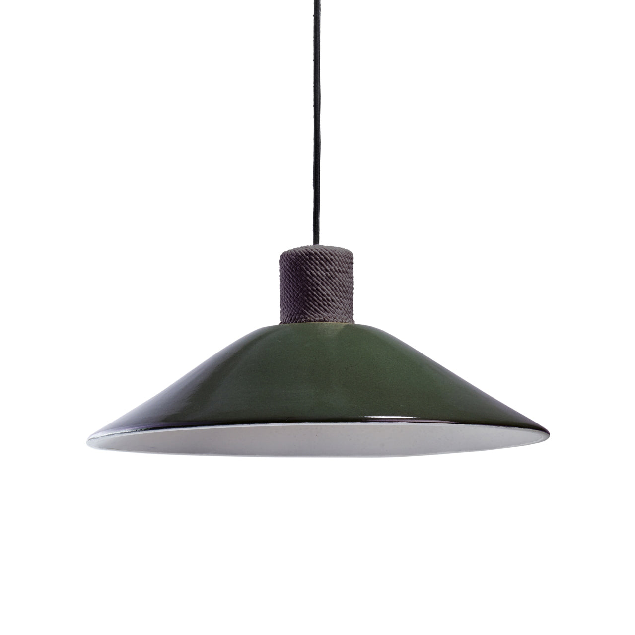 The Ames Raiz Pendant Lamp Large by Ames features Colombian craftsmanship with a wide, dark green ceramic conical shade and textured gray socket, suspended from a black cord against a white background.