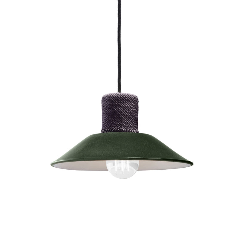 The Ames Raiz Pendant Lamp Small by Ames features a dark green, wide conical shade with a visible bulb and black cord. Its top section showcases Colombian craftsmanship with a distinctive dark textured finish above the shade.