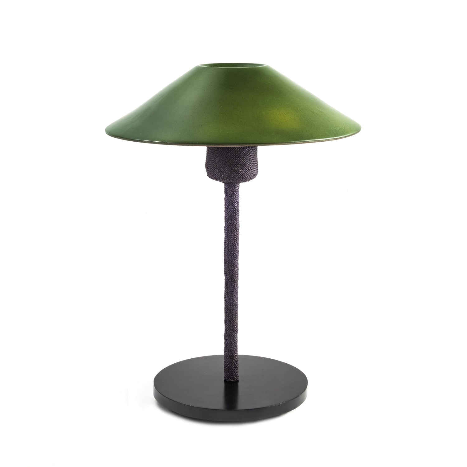 The Raiz Table Lamp by Ames features a wide green ceramic shade and textured black stem with a round black base, against a white backdrop, highlighting Colombian craftsmanship.