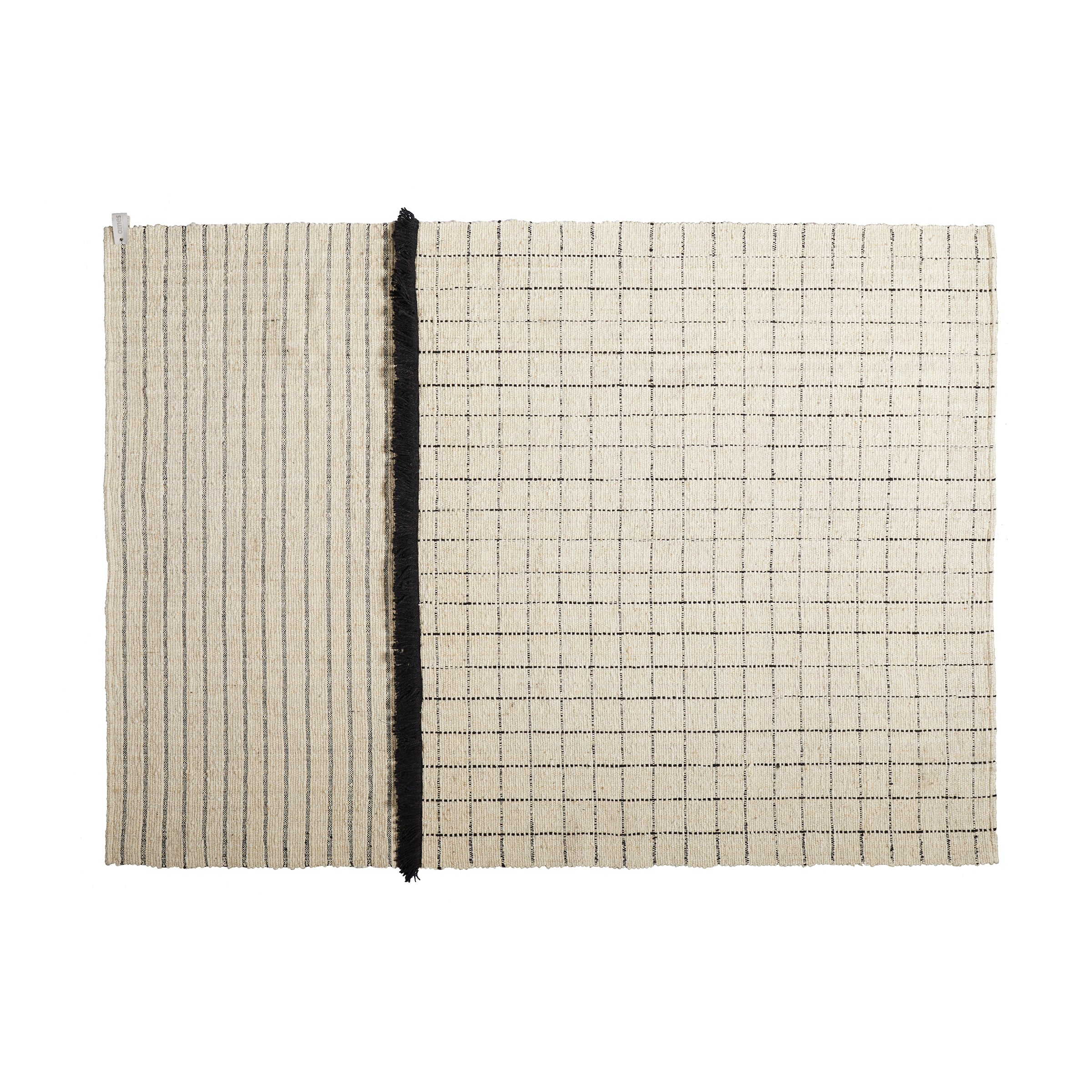 The Ames Subas Rug by Ames is a rectangular beige wool rug featuring thin black stripes on the left, a grid pattern on the right, and a bold vertical black dividing line.
