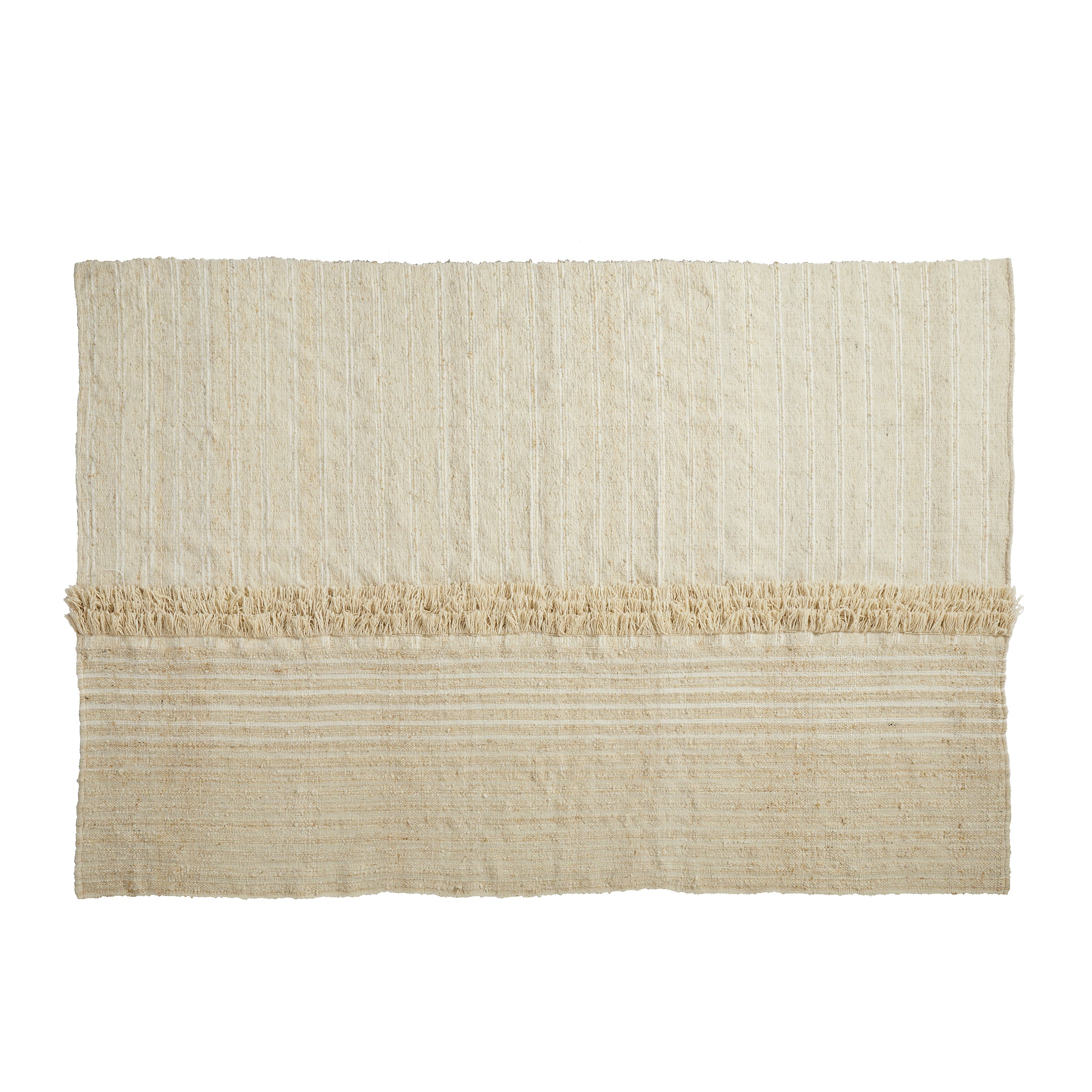 The Ames Subas Rug by Ames is a rectangular cream-colored wool rug featuring subtle horizontal stripes and a fringed band near one end, displayed on a white background and designed by Sebastian Herkner.
